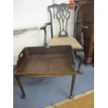 A 1920s Georgian style mahogany splat back armchair and a 19th century oak butlers tray style table