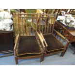 A pair of late 19th century ash and fruitwood armchairs with bobbin decoration