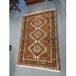 A Turkish geometric design rug with multiguard border, 49 1/2" x 33 1/2"