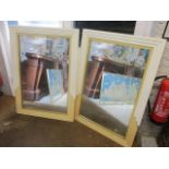 A pair of Art Deco inspired wall mirrors