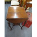 A late Victorian mahogany, four fall flap table, raised on cabriole legs