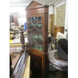 An Edwardian mahogany inlaid corner cabinet