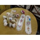 A group of Victorian style porcelain door furniture