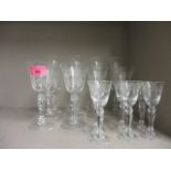 Etched champagne flutes, red wine glasses and sherry glasses