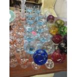 Turquoise glass Champagne saucers and mixed glass to include amber drinking glasses and coloured