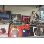 A large collection of 45 rpm records to include Elvis, T-Rex and The Beatles