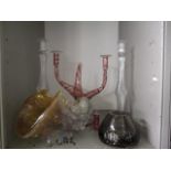 A Massimo Michelizz, iridescent shell, signed, a pair of glass candlesticks and other glassware, A/F