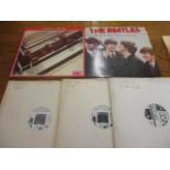 Five LPs, two of which are The Beatles