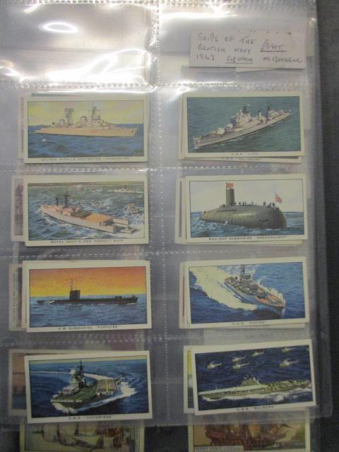 An album of 1924-1938 cigarette cards to include John Player War Decorations & Medals, Godfrey