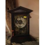 An American Ansonia mantel clock in mahogany case A/F