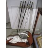 Six fencing foils, together with a white face mask and a leather case