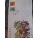 China - two albums containing Chinese stamps, postcards, first day cover, unmounted