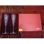 A pair of modern Baccarat Crystal champagne flutes, boxed