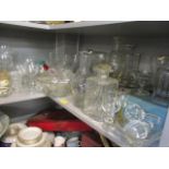 A large selection of glassware to include cut glass decanters, Champagne flutes and other mixed