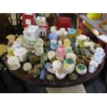 A large selection of Wade to include jugs, ashtrays, vases, ornaments, teapots and other items