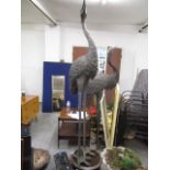 A modern patinated bronze model of a crane, 76" h