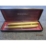 A Schaeffer gold filled two piece pen set, with a 14k gold nib