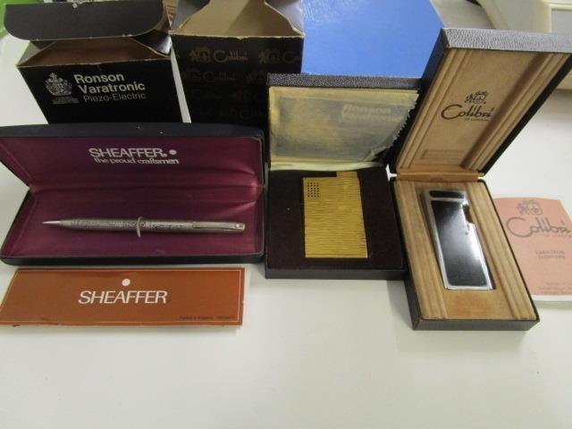 A 925 sterling silver Sheaffer propelling pencil, case with floral decoration, boxed with