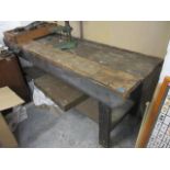 A large two tier work bench, 32" h x 85" w