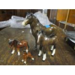 Two Beswick horses and two other china models of horses