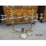 A pair of silver plated six-branch candelabras, together with other silver plated items