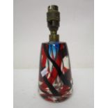 An Italian Murano glass table lamp base crossed internal black and red bands with controlled