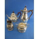 A 1920s matched four piece silver tea set by Adie Brothers, Birmingham and London 1923, of