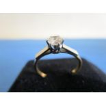 An 18ct gold and platinum solitaire diamond engagement ring 1.7g, total