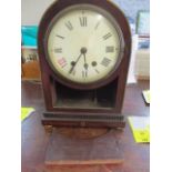 A Regency mahogany bracket clock with later movement