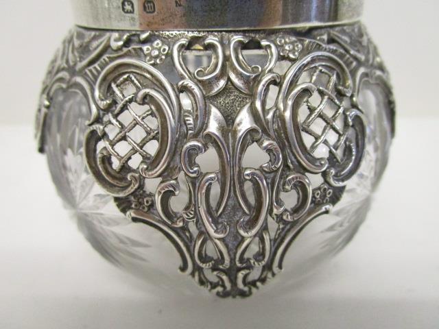 A Victorian clear glass and silver dressing table jar by Henry Matthews, Birmingham 1886 with a - Image 5 of 10