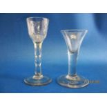 A mid 18th century wine glass with a trumpet shaped bowl and foldover foot, 5" h and a wine glass