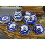 A Middleport Pottery blue and white tea set decorated with a landscape scene, forty pieces