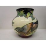 A Moorcroft pottery Inglewood pattern vase, designed by Philip Gibson, decorated with birds, 5 3/4"h