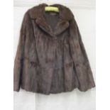 A good condition vintage mink jacket by Charles Moss Furs, in dark brown, approximately 25" long x