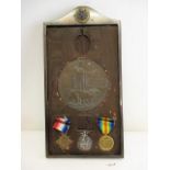 A WW1 medal group comprising a British War medal, a 1914-15 Star inscribed Lieut T M Graves 76/