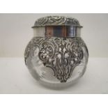 A Victorian clear glass and silver dressing table jar by Henry Matthews, Birmingham 1886 with a