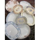 A quantity of early to mid 20th century china meat platters to include Wedgewood