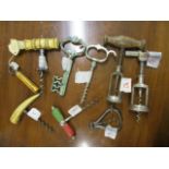 A collection of corkscrews to include a Skinner & Rock advertising example