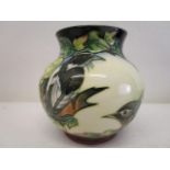 A Moorcroft pottery Inglewood pattern vase designed by Philip Gibson, decorated with birds, 5 3/4"h,