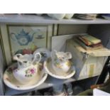 A mixed lot to include wash jugs and bowls, prints, a Capodimonte teapot, books and mixed china