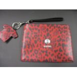 A Versus Versace clutch bag with a matching key ring/handbag charm in a red leopard print design and