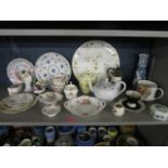 A selection of china to include a Coalport Snowman figurine, a jug stamped Florian ware and other