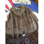 A good condition vintage mink jacket by Charles Moss Furs, in dark brown, approximately 25" long x