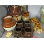 A Bourne Denby stoneware jug and others, a Cadbury stoneware jug and four chocolate mugs, a bohemian