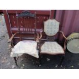 Two 1920s mahogany chairs to include an armchair having a carved top rail, spindle back and scrolled