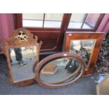 A reproduction Chippendale style walnut veneered mirror 29 1/2"h x 16 1/2"w, and two other wall