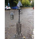 A mid 20th century cast iron Gothic style standard lamp