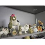 Three Beswick models of cats and dogs, together with other animal models to include Pendelfin