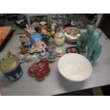 Mixed ceramics to include oriental pot lids, a Spode bowl, a pair of green glazed cat figures and