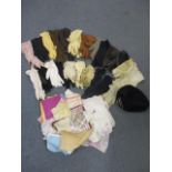 A large collection of ladies gloves and handkerchiefs to include driving gloves, together with a Red